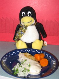 fetter Pinguin mit Füsch aufm Teller